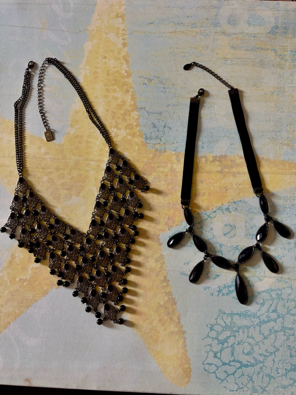2 elegant Black beaded necklaces.V shape black chain and other ribbon neckline.